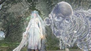 Elden Ring Nightreign Revenant build: Revenant standing next to a massive skeleton outside a ruin.