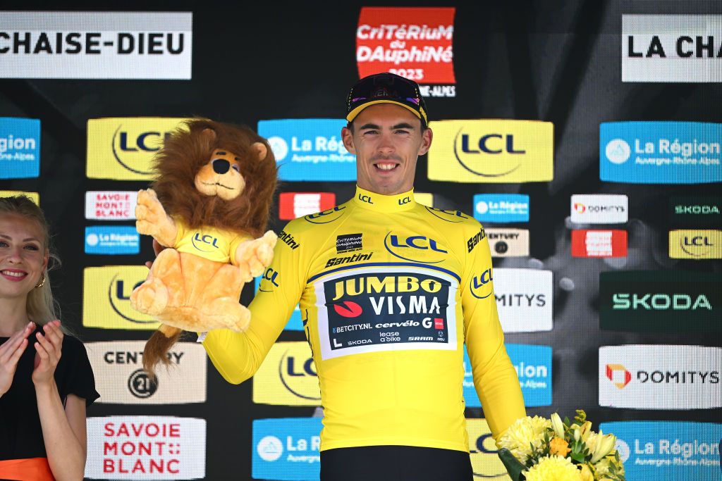 LA CHAISEDIEU FRANCE JUNE 05 Christophe Laporte of France and Team JumboVisma Yellow Leader Jersey celebrates at podium during the 75th Criterium du Dauphine 2023 Stage 2 a 1673km stage from BrassaclesMines to La ChaiseDieu 1080m UCIWT on June 05 2023 in La ChaiseDieu France Photo by Dario BelingheriGetty Images