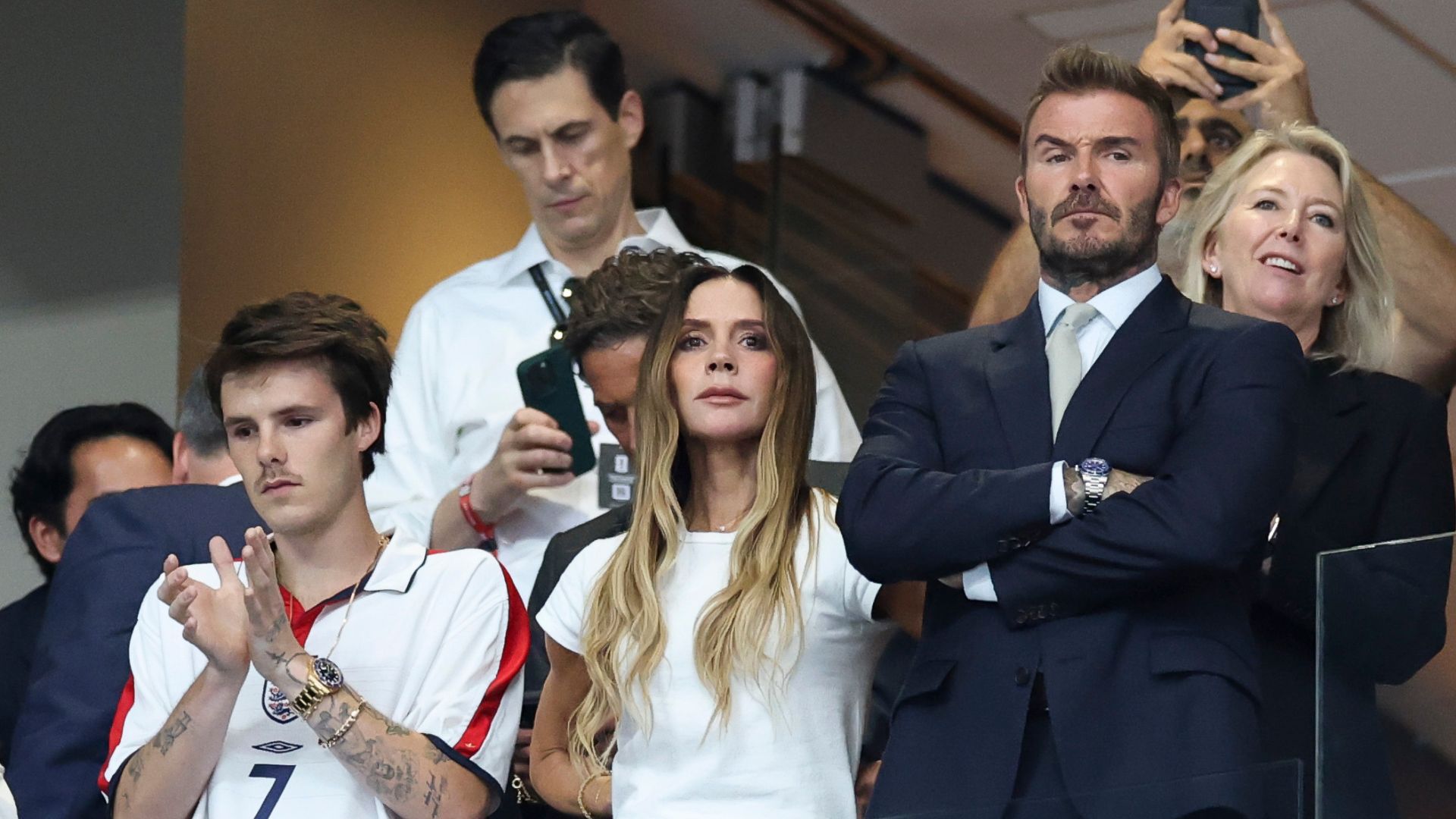 An image of Victoria Beckham wearing a white t-shirt and jeans to the 2026 World Cup semi-final England vs Argentina match.