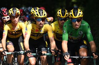 From R Team Jumbo rider Belgiums Wout van Aert wearing the best sprinters green jersey Team Jumbo rider Slovenias Primoz Roglic wearing the overall leaders yellow jersey Team Jumbo rider Netherlands Tom Dumoulin and Team Jumbo rider US Sepp Kuss ride during the third stage of the 72nd edition of the Criterium du Dauphine cycling race 157 km between Corenc and SaintMartindeBelleville on August 14 2020 Photo by AnneChristine POUJOULAT AFP Photo by ANNECHRISTINE POUJOULATAFP via Getty Images