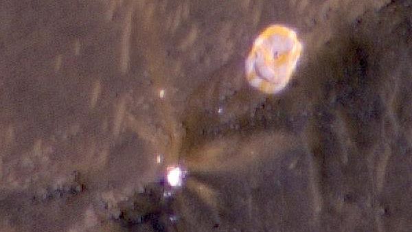 Perseverance deployed a supersonic parachute from its aeroshell about four minutes after entering the Martian atmosphere. The parachute helped slow the rover down during its descent to the surface before it separated from the spacecraft. This image, captured on Feb. 19 by the High Resolution Imaging Experiment (HiRISE) camera aboard the Mars Reconnaissance Orbiter, shows where the parachute landed on the Red Planet&rsquo;s surface. This photo is actually a zoomed in version of a larger aerial photo captured by HiRISE showing where the different parts of the Mars 2020 spacecraft landed.