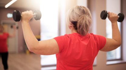 Women doing dumbbell arm workout