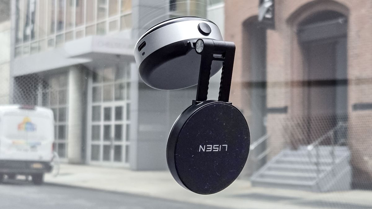 Portable Vacuum Magnetic Phone Holder Stand against windshield.