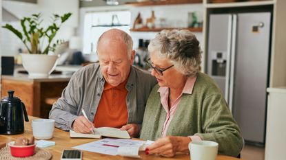 older couple saving