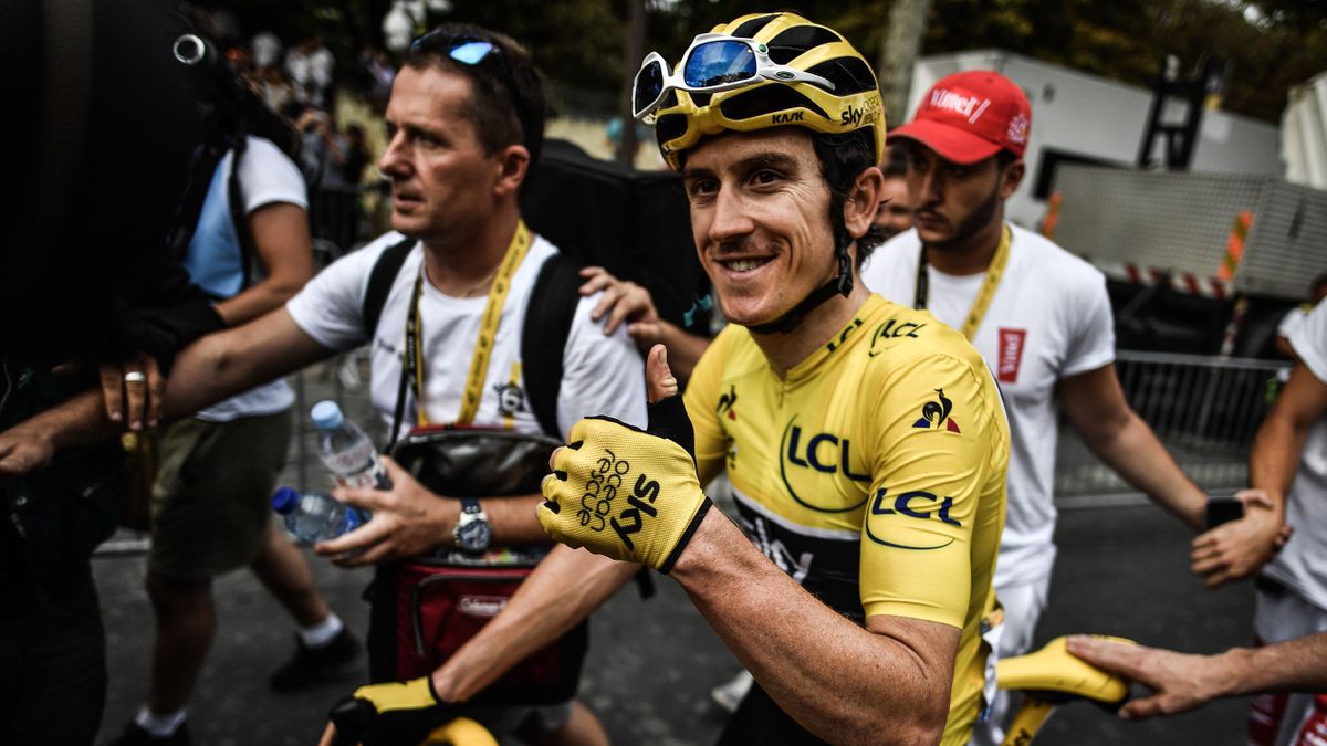 TOPSHOT - Tour de France winner Great Britain&#039;s Geraint Thomas wearing the overall leader&#039;s yellow jersey gives the thumbs up after the 21st and last stage of the 105th edition of the Tour de France cycling race between Houilles and Paris Champs-Elysees, on July 29, 2018. (Photo by Marco BERTORELLO / AFP) (Photo credit should read MARCO BERTORELLO/AFP via Getty Images)