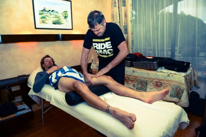 Daniel Oss is one of the first riders on the massage table