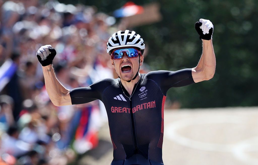 ELANCOURT FRANCE JULY 29 EDITORS NOTE Alternate crop Thomas Pidcock of Team Great Britain celebrates at finish line as gold medal winner during the Mens CrossCountry on day three of the Olympic Games Paris 2024 at Elancourt Hill on July 29 2024 in Elancourt France Photo by Alex BroadwayGetty Images