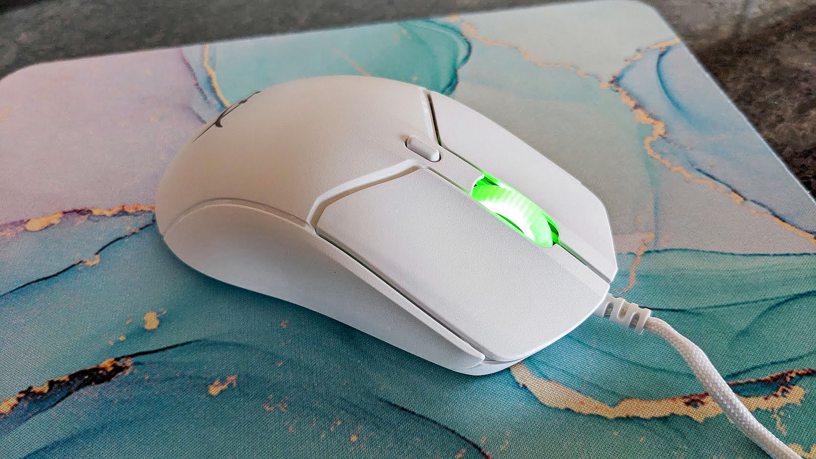Mouse para jogos HyperX Pulsefire Haste 2 com iluminação verde