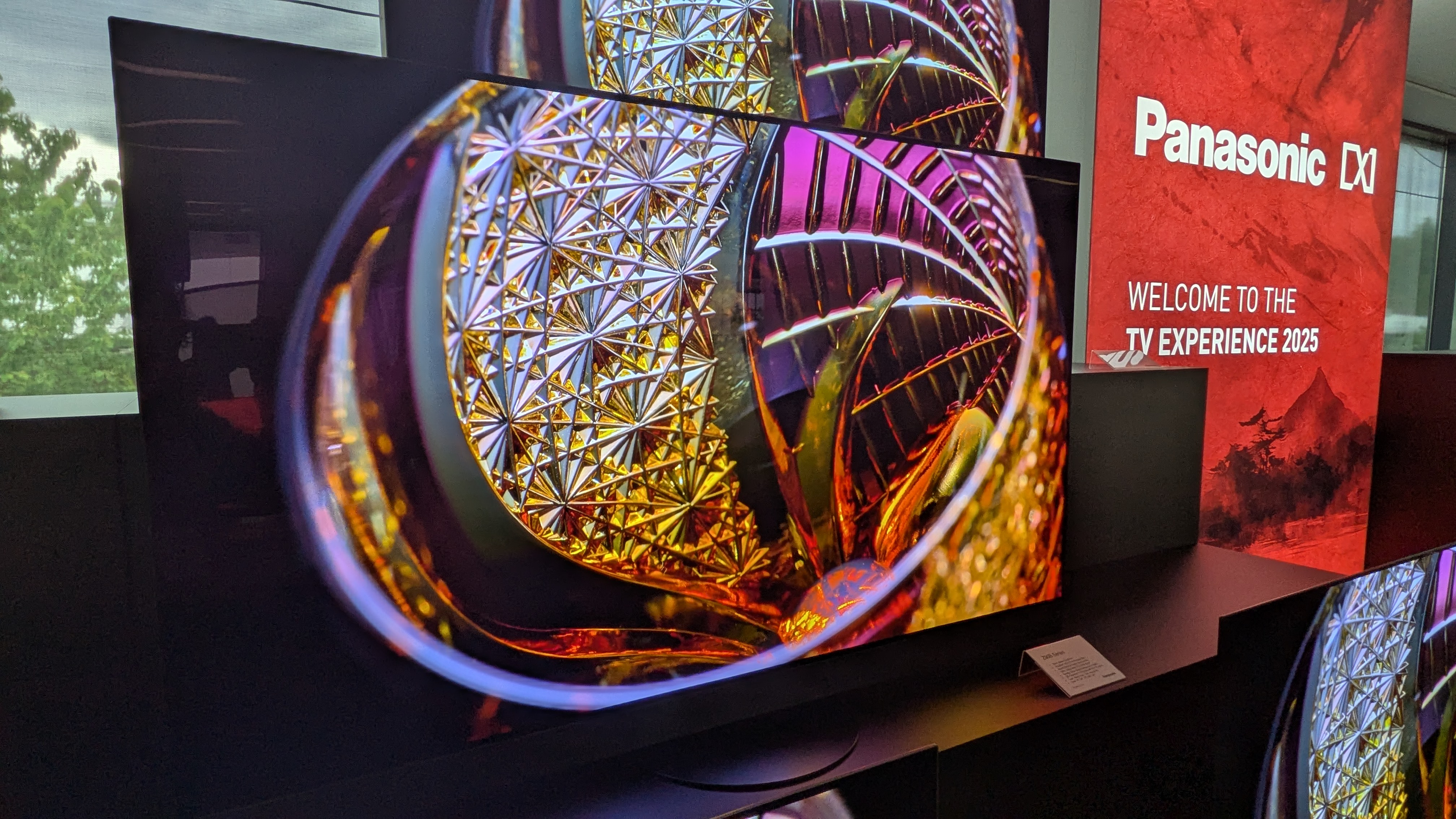 Panasonic Z90B OLED TV displaying colored glass on screen