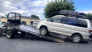 The van is towed away