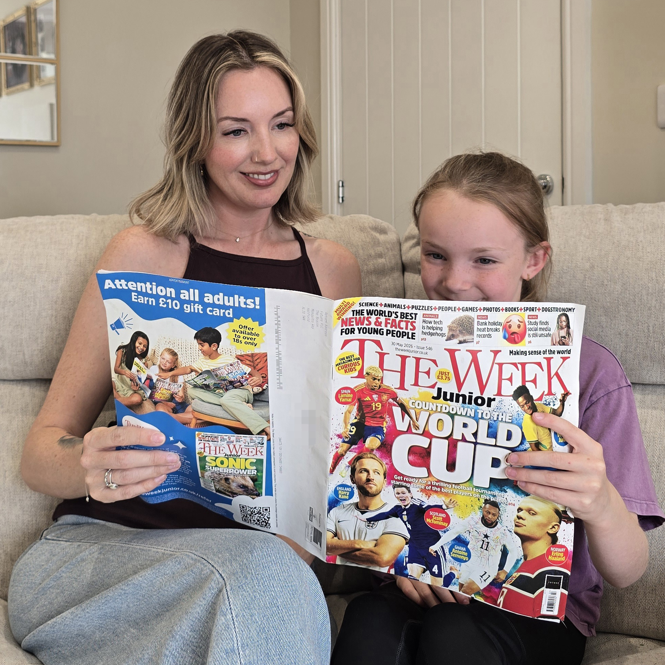 Emily aka Maverick mother reading The Week Junior with her daughter