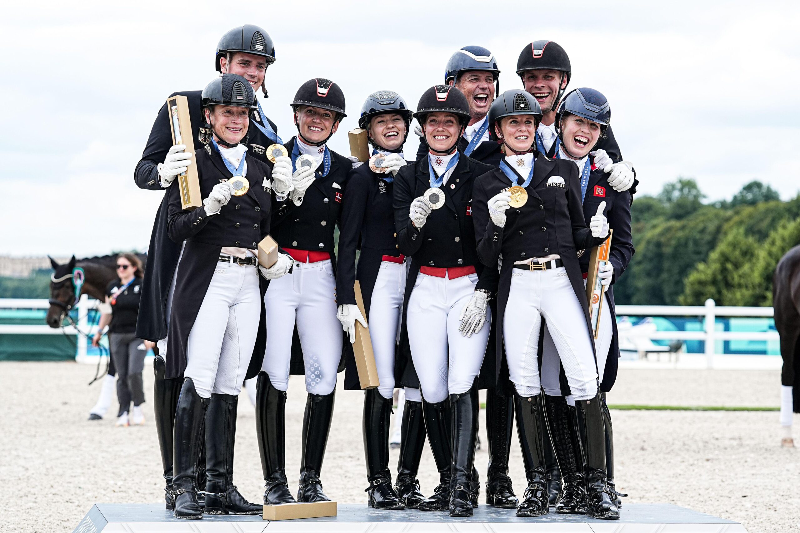 Becky-Moody-on-podium-with-idols-2XRY90G-scaled.jpg