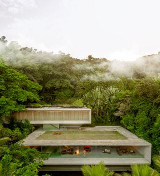 casa paraty, a concrete home seen from above in the brazilian jungle