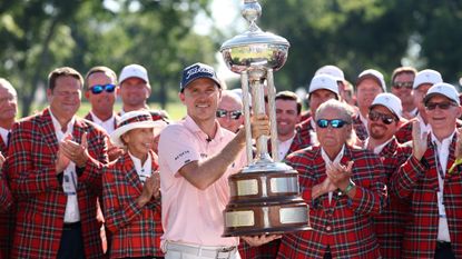 Russell Henley with the Charles Schwab Challenge trophy
