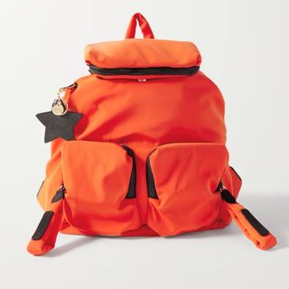 orange rucksack with charms