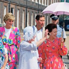 Queen Elizabeth, Princess Diana, Prince Charles, the Queen Mother, and Princess Margaret all wear summer attire