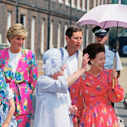 Queen Elizabeth, Princess Diana, Prince Charles, the Queen Mother, and Princess Margaret all wear summer attire