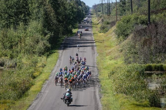 The field spreads out over one of the courses rough roads