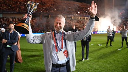 Roman Abramovich holds the Fifa Club World Cup trophy after Chelsea’s 2-1 win against Palmeiras 