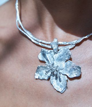 woman wearing silver jewellery