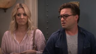 leonard and penny standing outside apartment door on the big bang theory