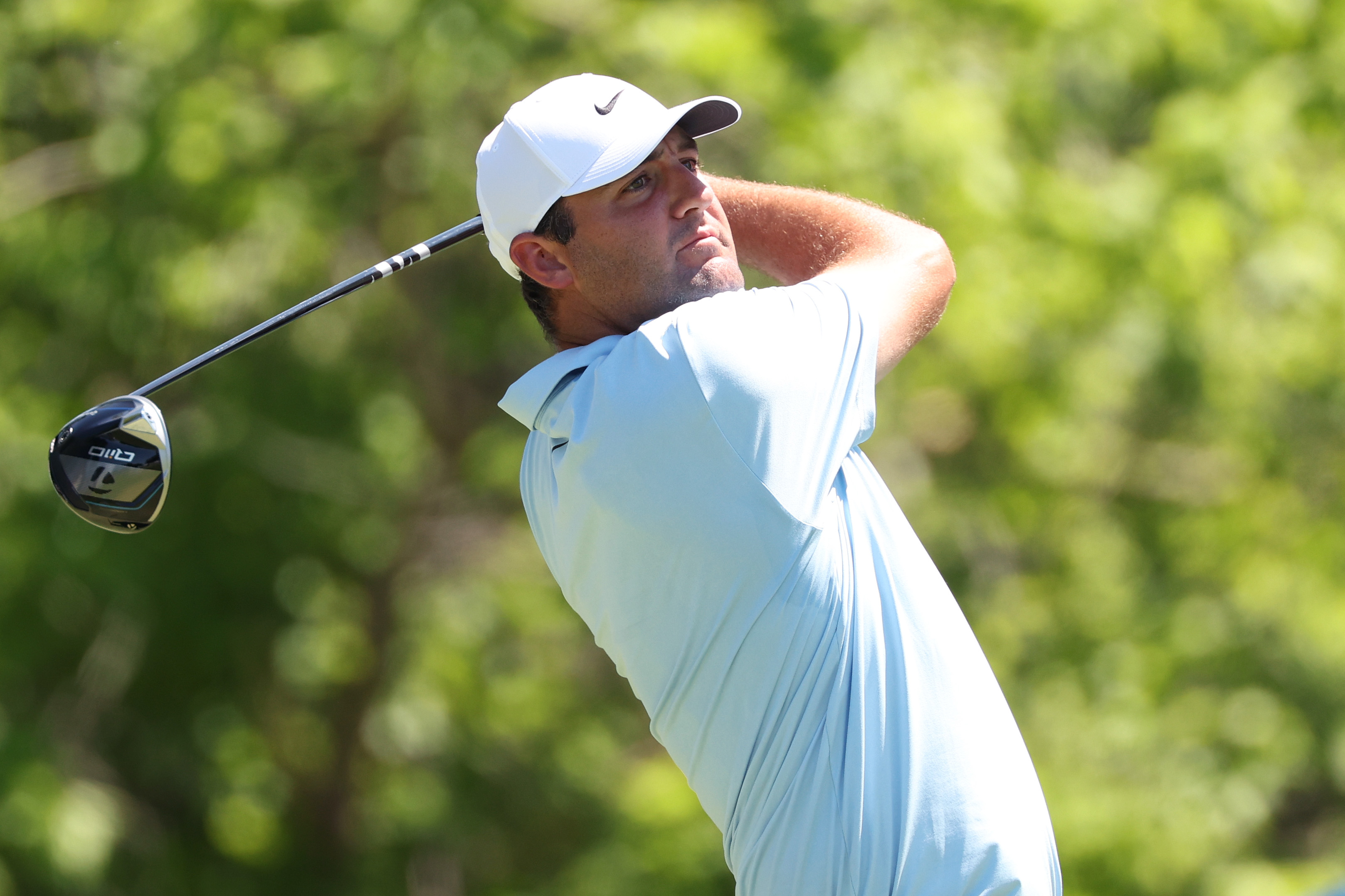 Scottie Scheffler hits a driver off the tee