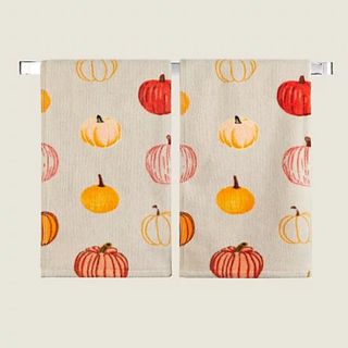 Pumpkin print hand towel set of two in cream 