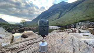 Camping stove on a rock