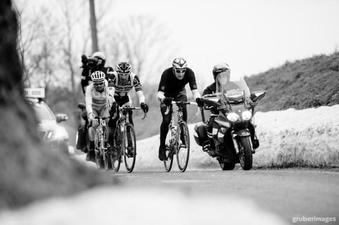 The early three-man break work together in the near freezing conditions