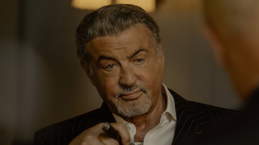 Dwight smoking cigar talking to Dunmire in Tulsa King Season 3