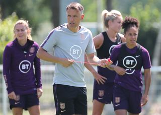 England head coach Phil Neville is not concerned by the surprise visit of USA officials to his team's hotel