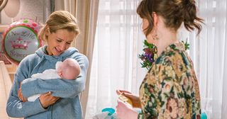 Meanwhile, emotional Eva returns to Weatherfield and cuddles baby Susie.