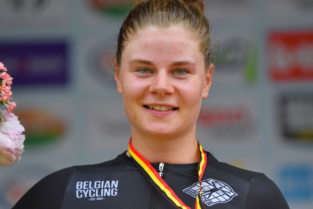 WAREGEM BELGIUM JUNE 20 Lotte Kopecky of Belgium Gold Medal Belgian Champion Jersey celebrates at podium during the 122th Belgian Road Championship 2021 Womens Road Race a 1224km one day race from Waregem to Waregem BELCycling belgiancycling on June 20 2021 in Waregem Belgium Photo by Luc ClaessenGetty Images