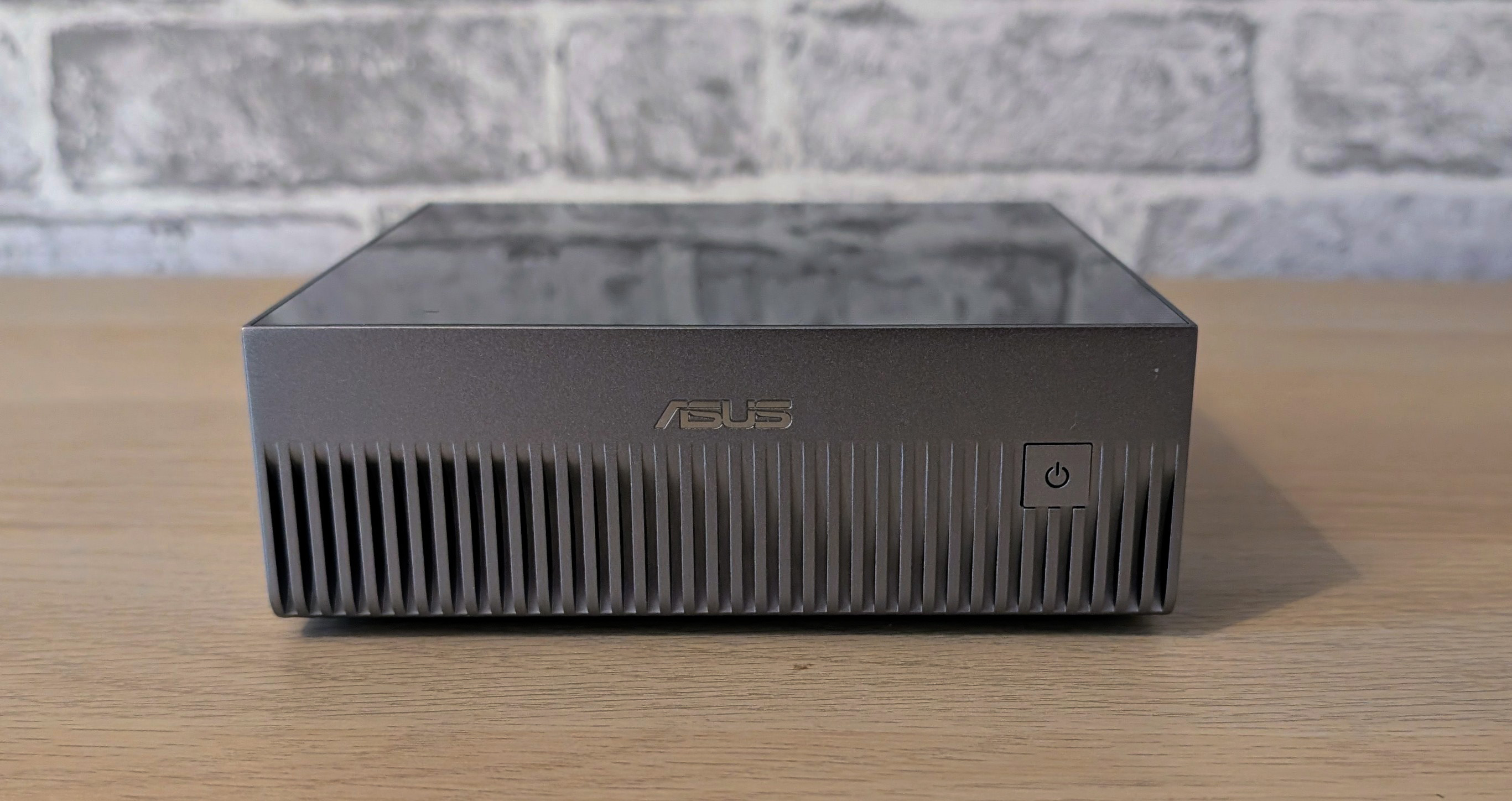 The Asus Ascent GX10 on a desk