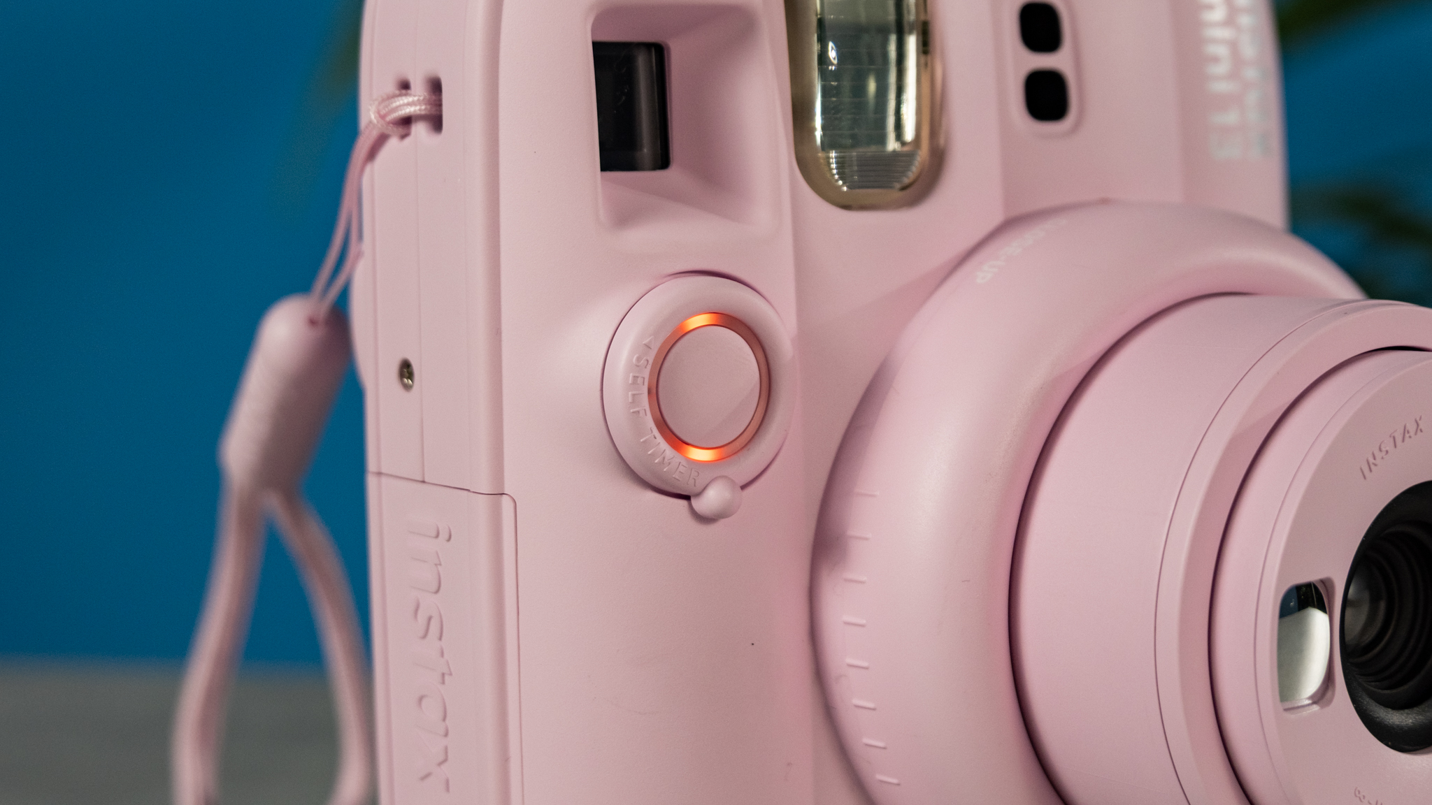 A Candy Pink Fujifilm Instax mini 13 instant camera