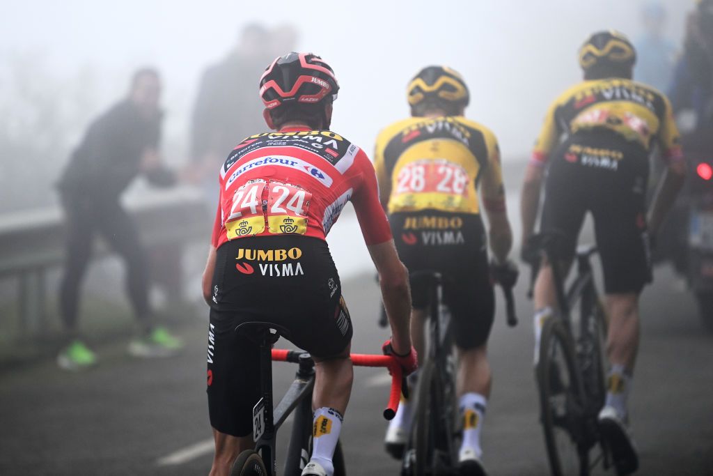 ALTU DE LANGLIRU SPAIN SEPTEMBER 13 LR Sepp Kuss of The United States Red Leader Jersey Jonas Vingegaard of Denmark and Primo Roglic of Slovenia and Team JumboVisma compete in the breakaway during the 78th Tour of Spain 2023 Stage 17 a 1244km stage from Ribadesella Ribeseya to Altu de LAngliru 1555m UCIWT on September 13 2023 in Altu de LAngliru Spain Photo by Tim de WaeleGetty Images