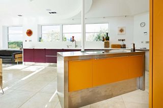Colourful modern kitchen with large island