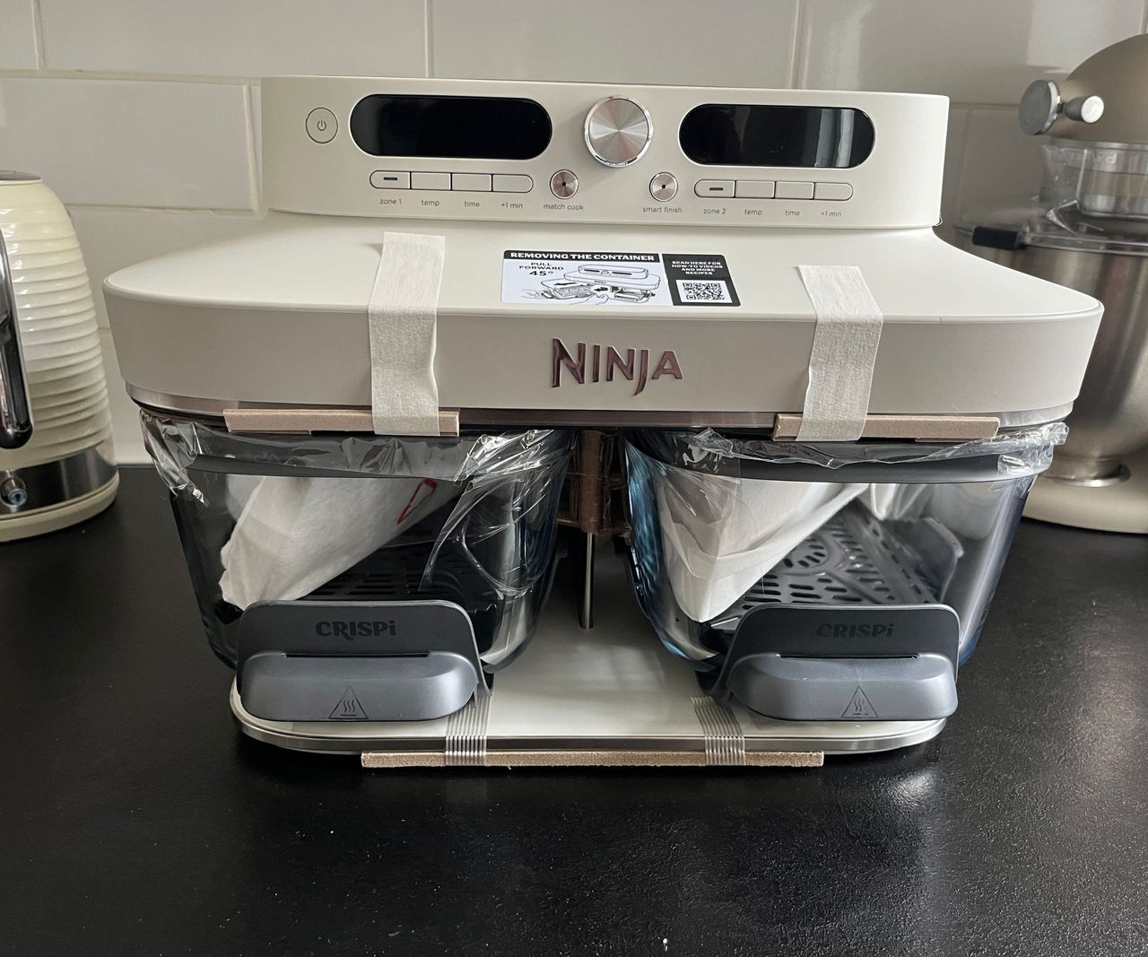 The Ninja Crispi DualZone with two glass baskets in bone white