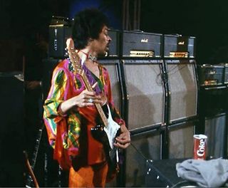 Jimi Hendrix with his Marshall Super Lead 100