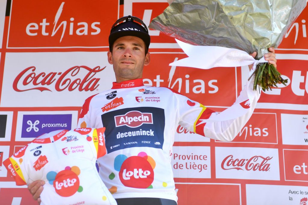 HERVE BELGIUM JULY 24 Gianni Vermeersch of Belgium and Team AlpecinDeceuninck celebrates winning the Polka Dot Mountain Jersey on the podium ceremony after the 43rd Ethias Tour de Wallonie 2022 Stage 2 a 1768km stage from Verviers to Herve 274m ethiastourdewallonie22 on July 24 2022 in Herve Belgium Photo by Luc ClaessenGetty Images