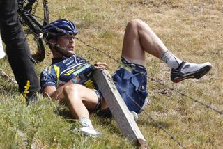 Johnny Hoogerland is caught in barbed wire after a crash during stage nine of the 2011 Tour de France