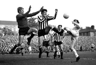 Sunderland's Joe Baker has his shot saved in a game against Newcastle in 1969.