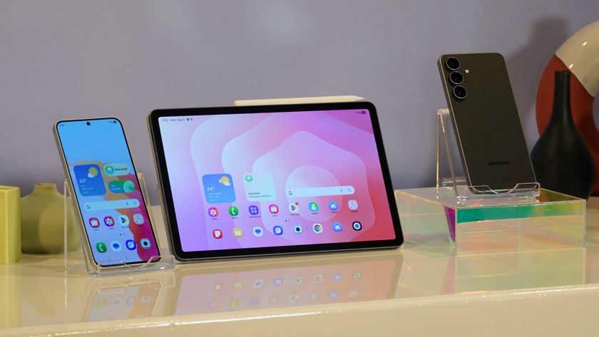 The Samsung Galaxy Tab S11 in between two Samsung Galaxy S25 FE models.