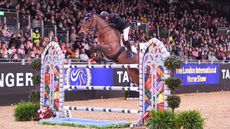 John Whitaker GBR riding Unick du Francport during The Santa Stakes (Class 03) at The London International Horse Show at the ExCel London in the UK, on the 16th December 2021