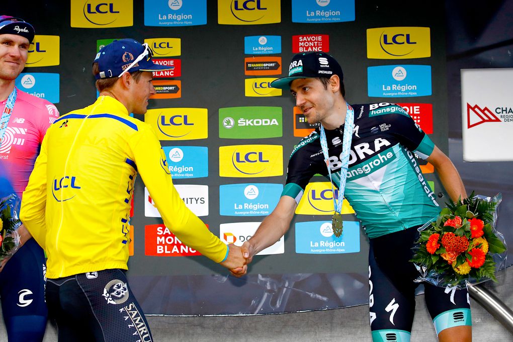 Jakob Fuglsang and Emanuel Buchmann on the Dauphine podium