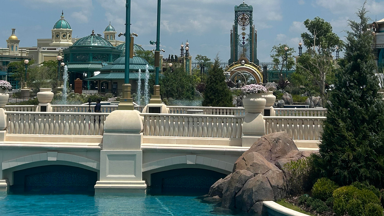 View of Celestial Park with the portal in the distant background and showing off limited shade.