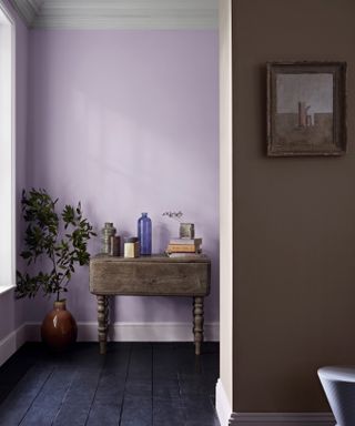 Lavender painted hallway with home decor accessories