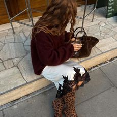 An image of influencer @rebeccaferrazwyatt wearing leopard print shoes.