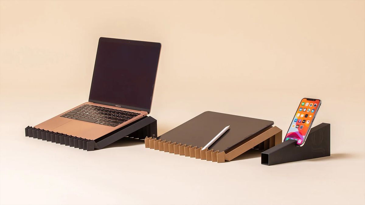 Laptop stand created from a single sheet of recycled paper supports up to 10 pounds — the included cardboard case also serves as a phone stand