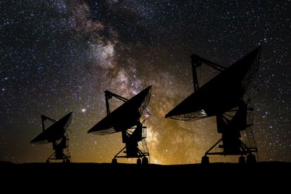 Large radio telescopes on the background of the starry sky